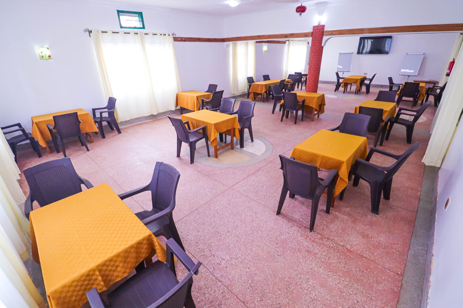 Banquet-style hall arranged for weddings and receptions